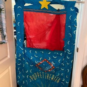 Puppet theater that hangs in doorway
